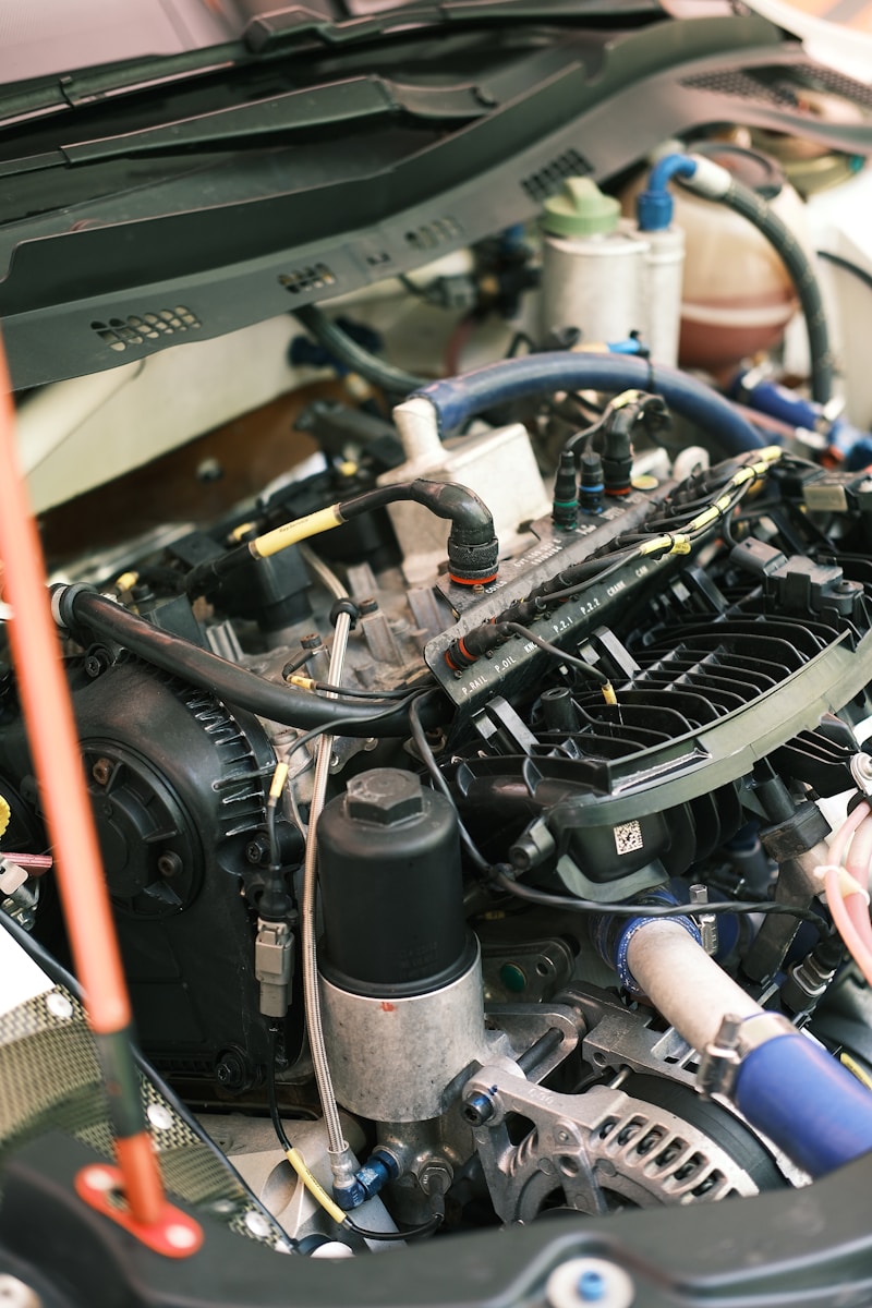 the engine compartment of a car with the hood open